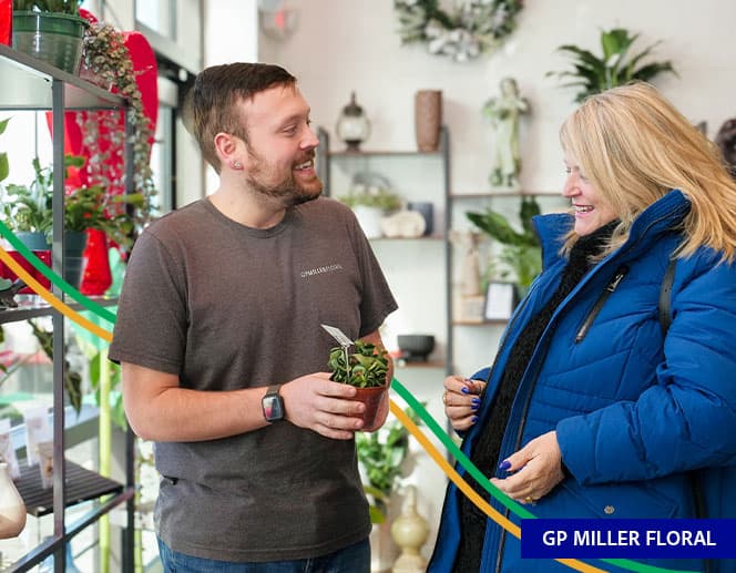 Florist with customer at GP Miller Floral Shop